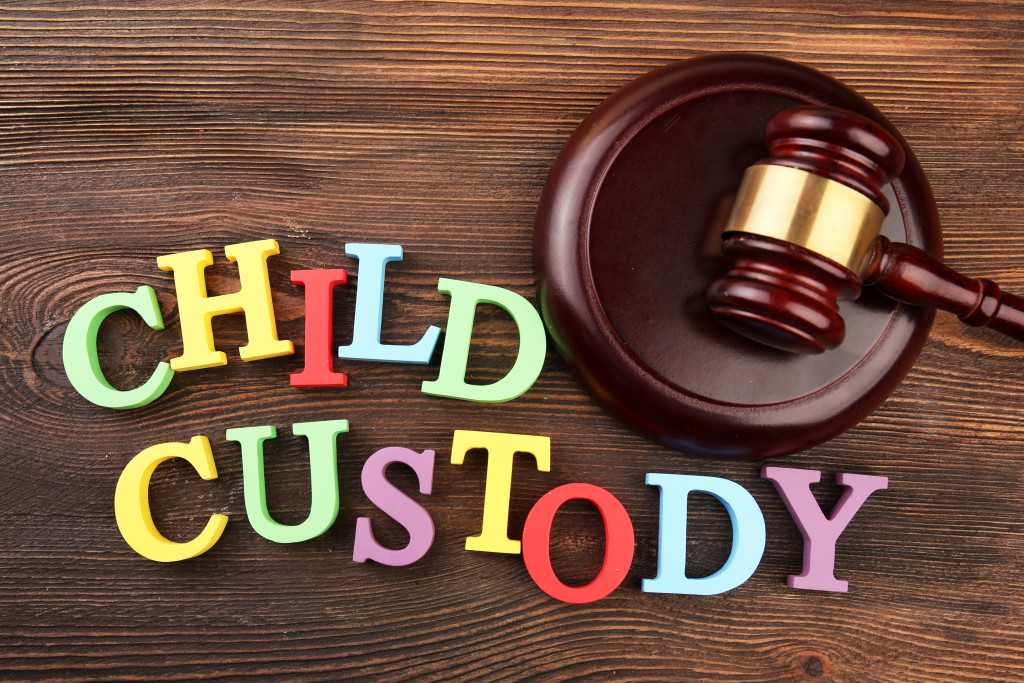 child custody in colored letters spelled out next to gavel